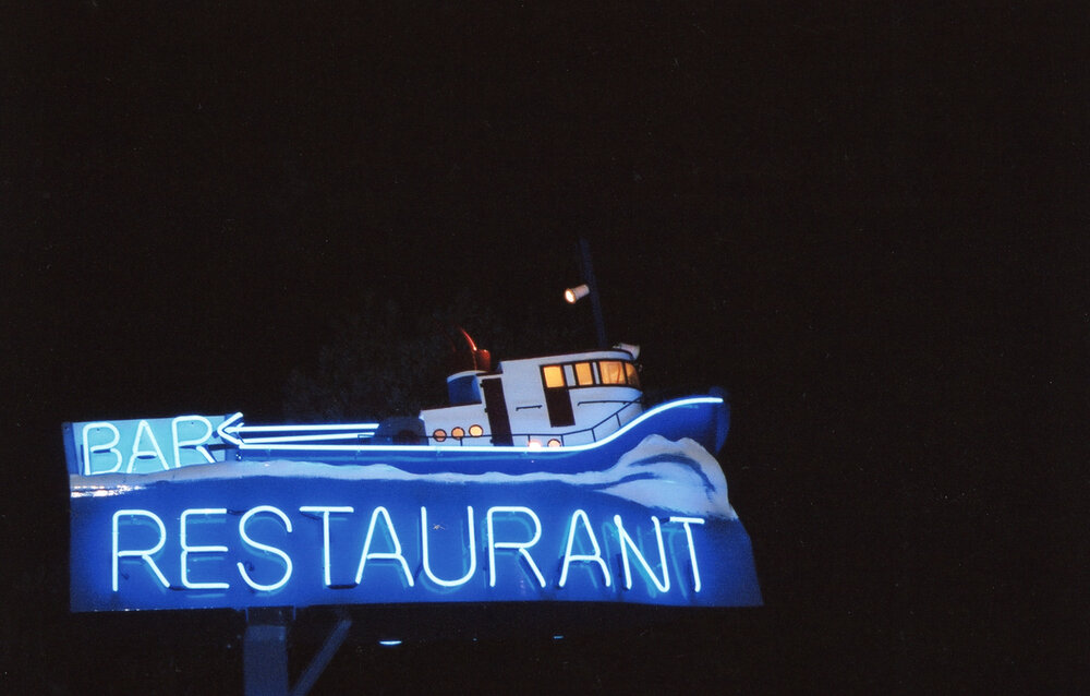 Tugboat on the Bay (sign/sculpture)