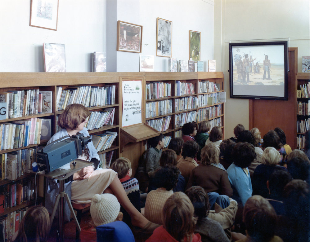 Children viewing a film strip