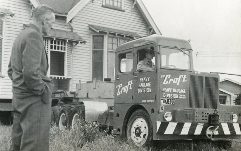 Norm Croft supervising house relocation