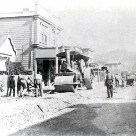 Workers preparing road for tram lines