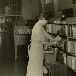 Shelving book in the Central Library