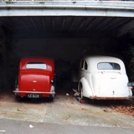 Vintage vehicles in a carport 