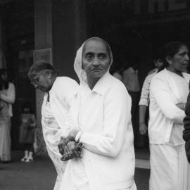 Members of the Indian community outside the Plaza Theatre