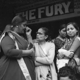 Members of the Indian community outside the Plaza Theatre