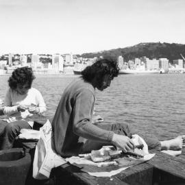 Eating fish & chips on the Overseas Terminal wharf