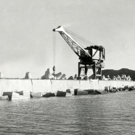 Crane on Lyall Bay breakwater